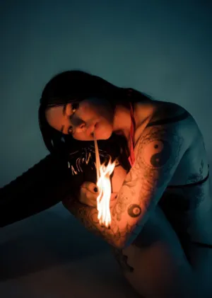 Tattooed Model With Fire