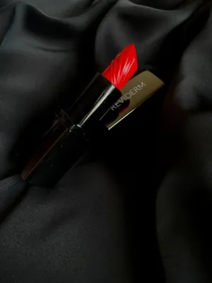 Red Lipstick On Black Fabric