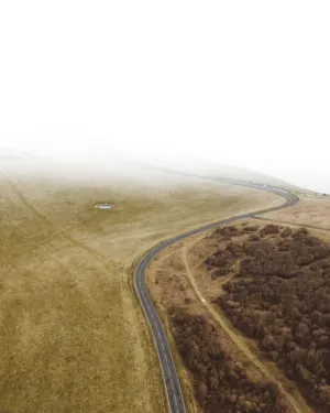 Winding Road Through Fields