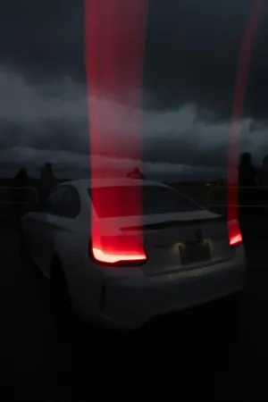 White Bmw With Red Lights