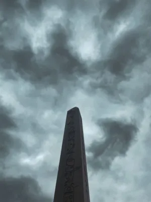 Obelisk Under Stormy Skies
