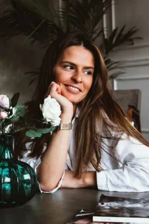 Smiling Woman With Flowers