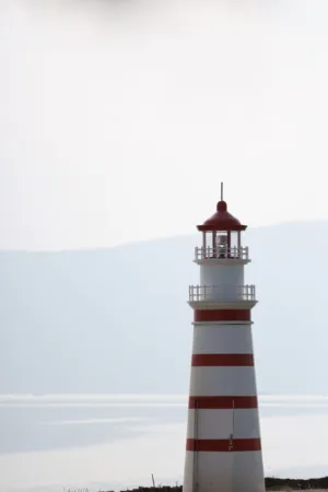 Lighthouse By The Sea