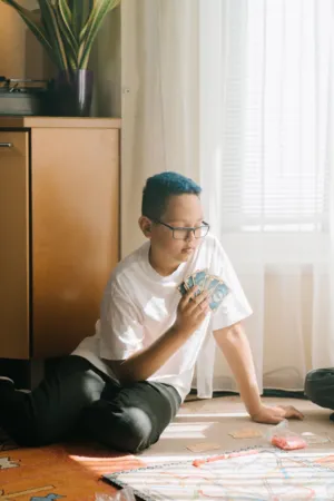 Teenager Playing Cards