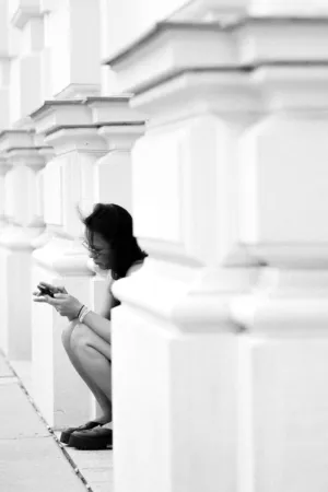 Crouching With Phone
