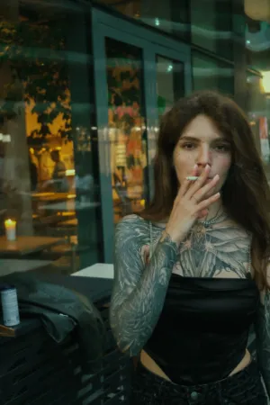 Tattooed Woman Smoking