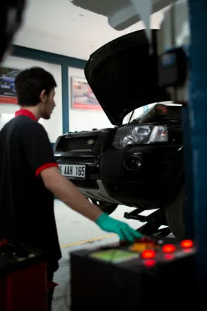 Auto Mechanic At Work