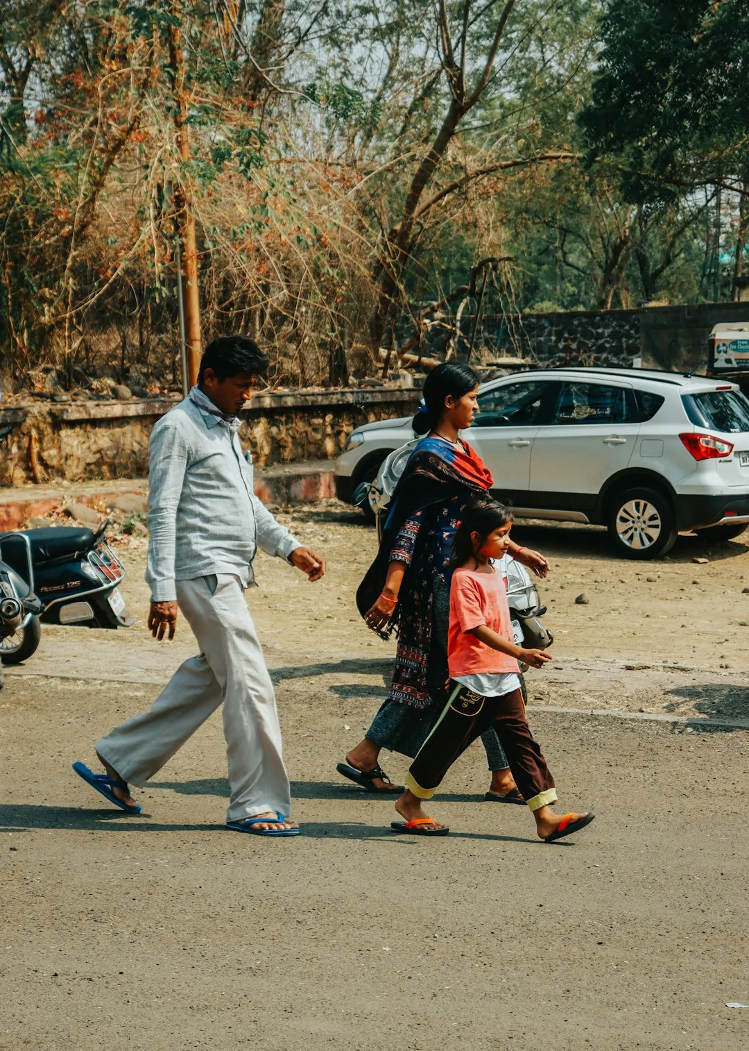Family Walking On A Road