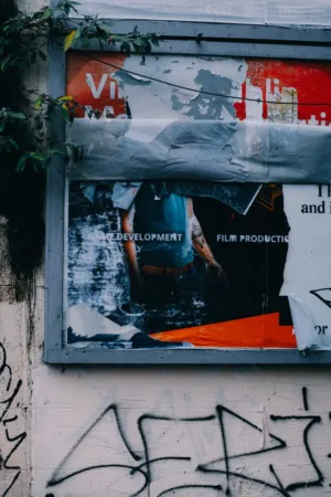 Urban Graffiti And Torn Poster