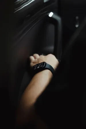 Hand With Smartwatch In Car