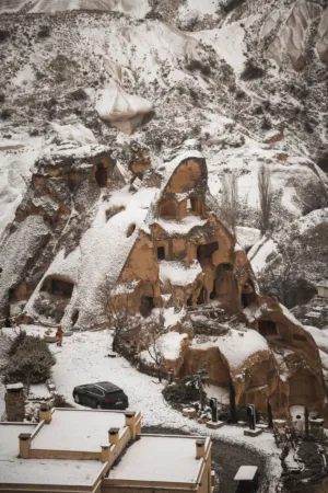 Snowy Cave Houses In Cappadocia