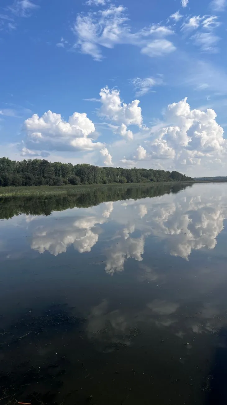 Cloud Reflections On A Calm Lake