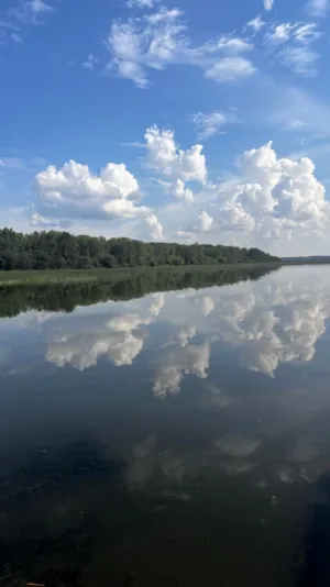 Cloud Reflections On A Calm Lake