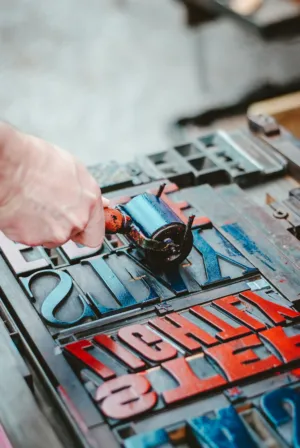 Hand Applying Ink To Letterpress Type