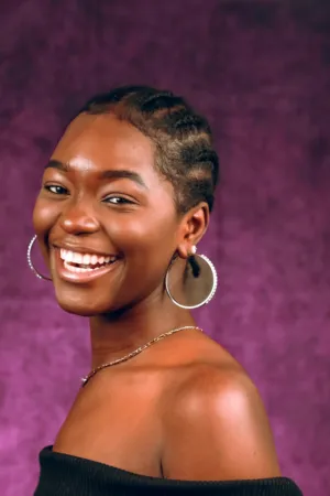 Smiling Woman With Braided Hair