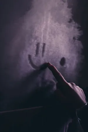 Hand Pointing At A Smiley Face