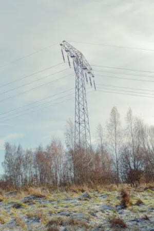Electrical Pylon In Winter Landscape