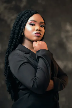 Black Woman In Black Blazer