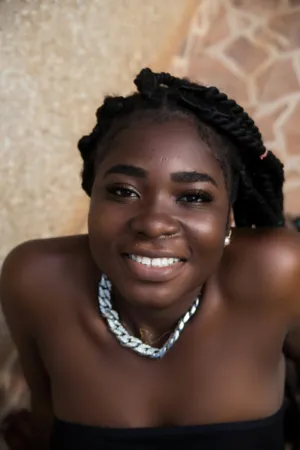 Smiling Woman With Braids