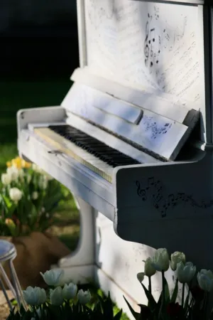 White Piano In A Garden