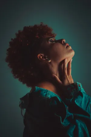 Portrait Of A Woman With Curly Hair