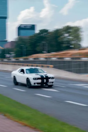 White Muscle Car On Highway