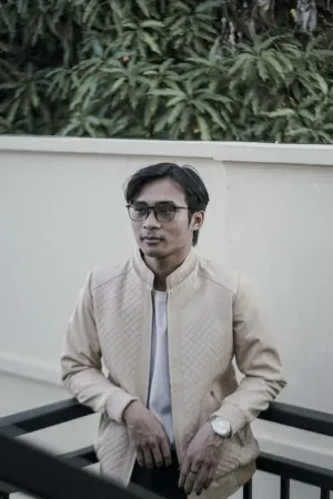 Man In Beige Jacket