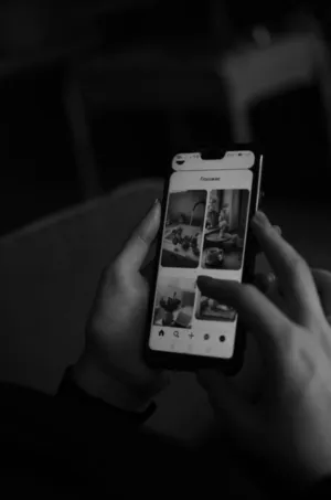 Hand Holding Smartphone With App