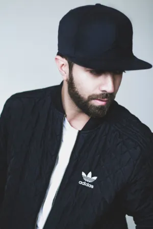 Black Bomber Jacket And Adidas Cap