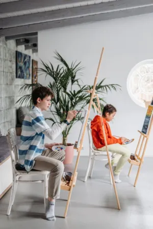 Children Painting In Studio