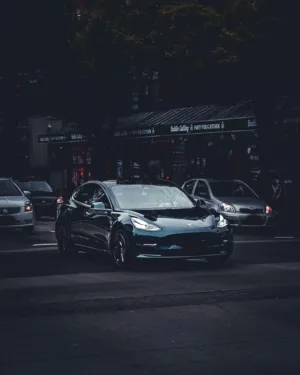 Black Tesla Model 3 On City Street