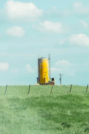 Yellow Silo In A Field