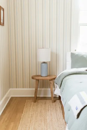 Cozy Bedroom With Striped Wallpaper