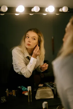 Young Woman Applying Makeup