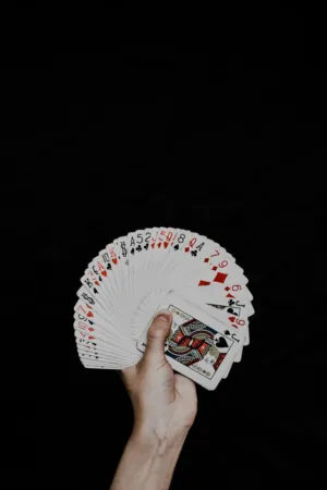 Hand Holding Playing Cards