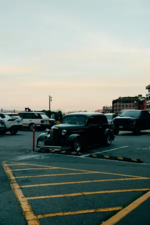 Vintage Car In Parking Lot