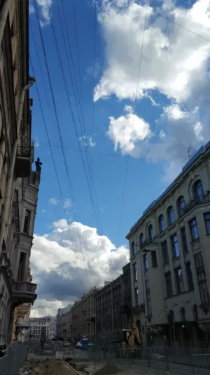 Urban Skyline With Power Lines