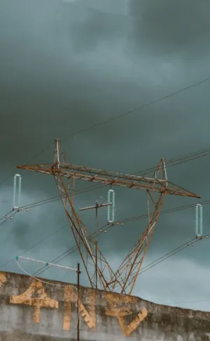 Power Lines Against Stormy Sky