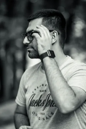 Man In Glasses And T-Shirt