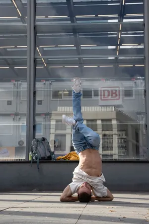 Man Performing A Handstand