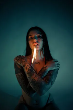 Tattooed Woman With Fire