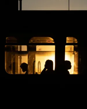 Silhouettes In Train Window