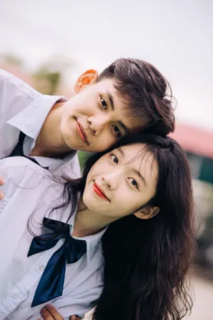 Teenage Couple In School Uniforms