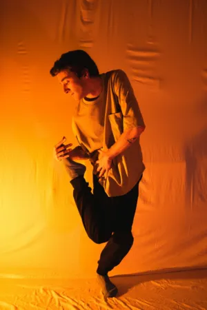 Dancer In Orange Light