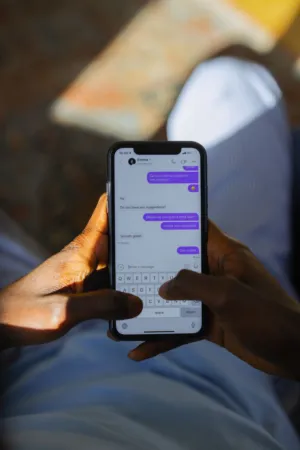 Person Texting On Smartphone
