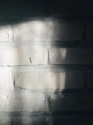 Light And Shadow On A Brick Wall