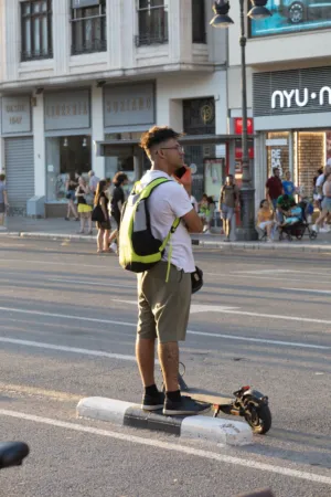 Man With Backpack And Skateboard