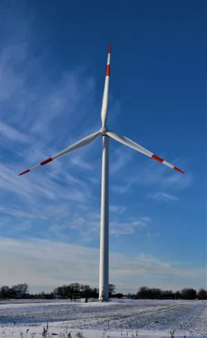 Wind Turbine In Winter Landscape