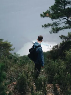 Hiker On A Cliff