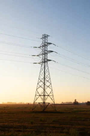 Electricity Pylon At Sunset